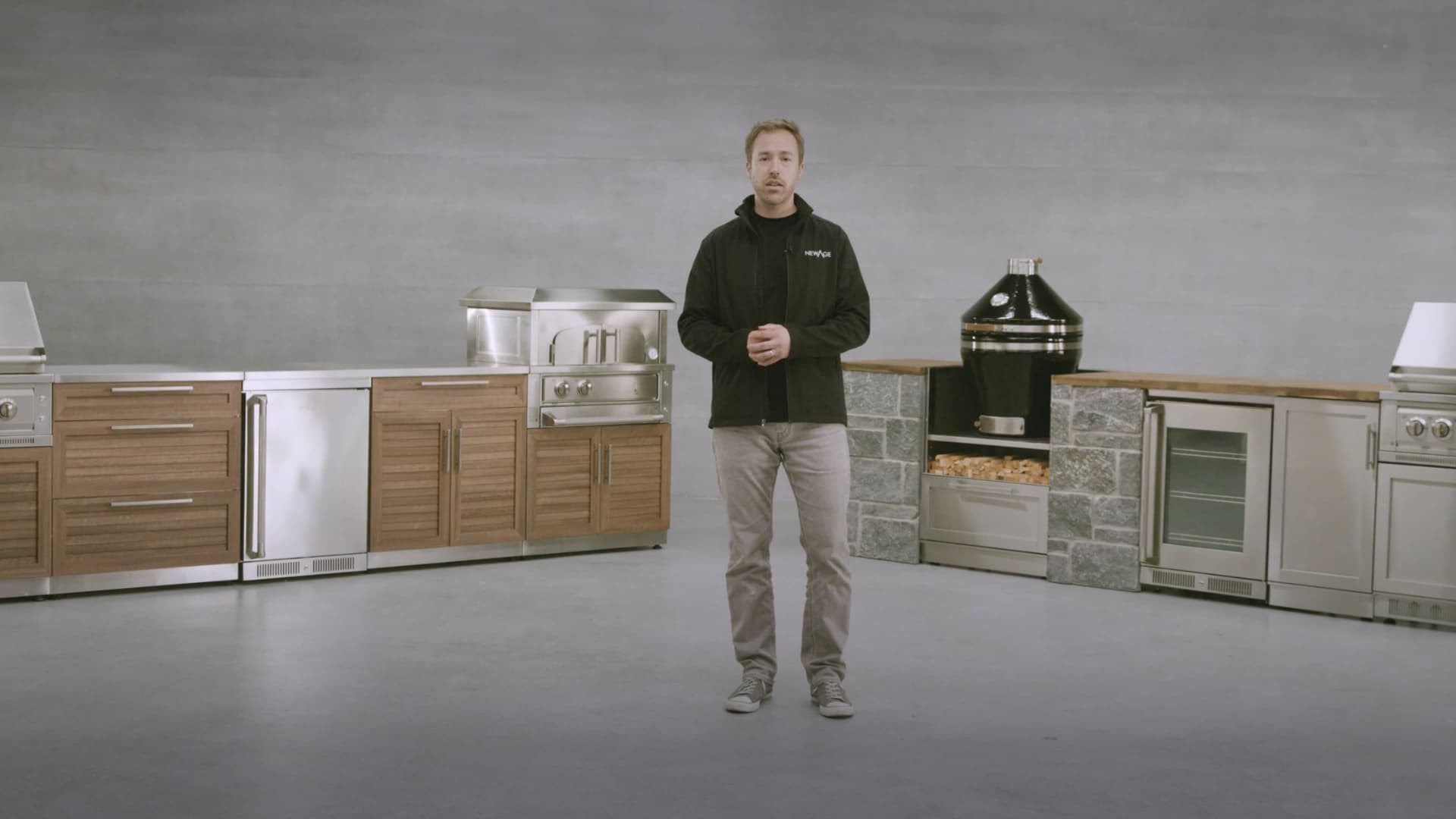 A NewAge designer planning a garage and outdoor kitchen project with a customer