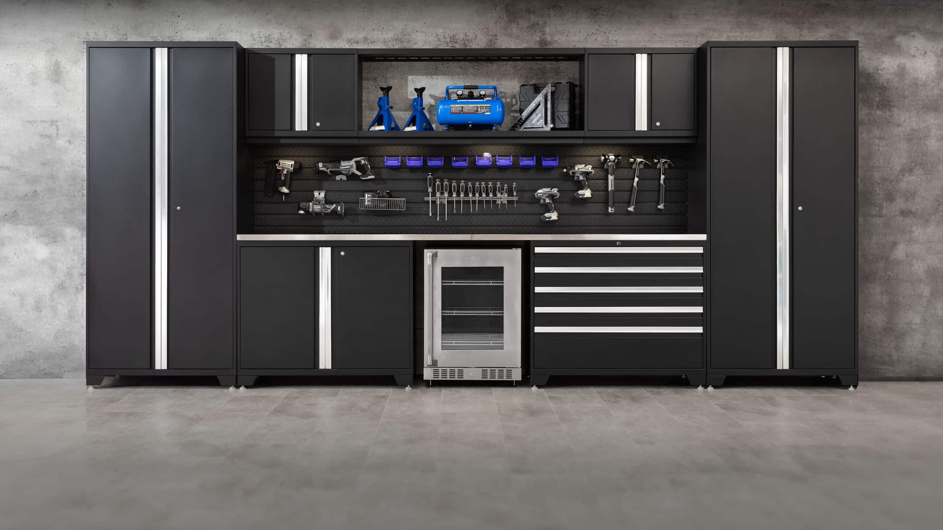 NewAge garage cabinets, wall shelving and overhead racks installed in a finished garage